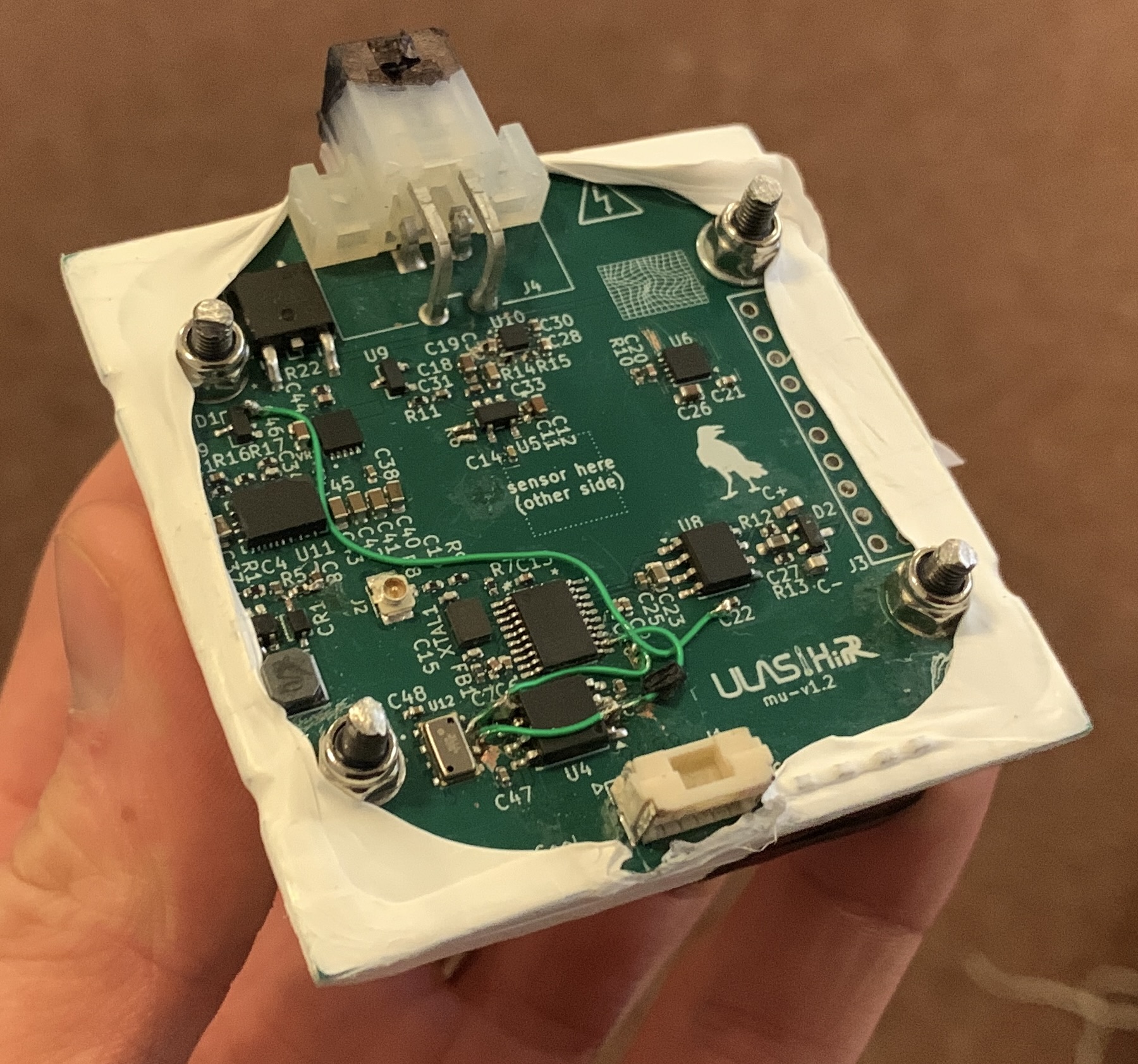 Mu detector board assembled around its wrapped scintillator